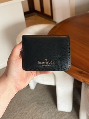 kate spade black leather mini wallet with gold logo